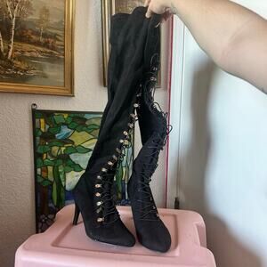 charming Charlie black lace up thigh high boots